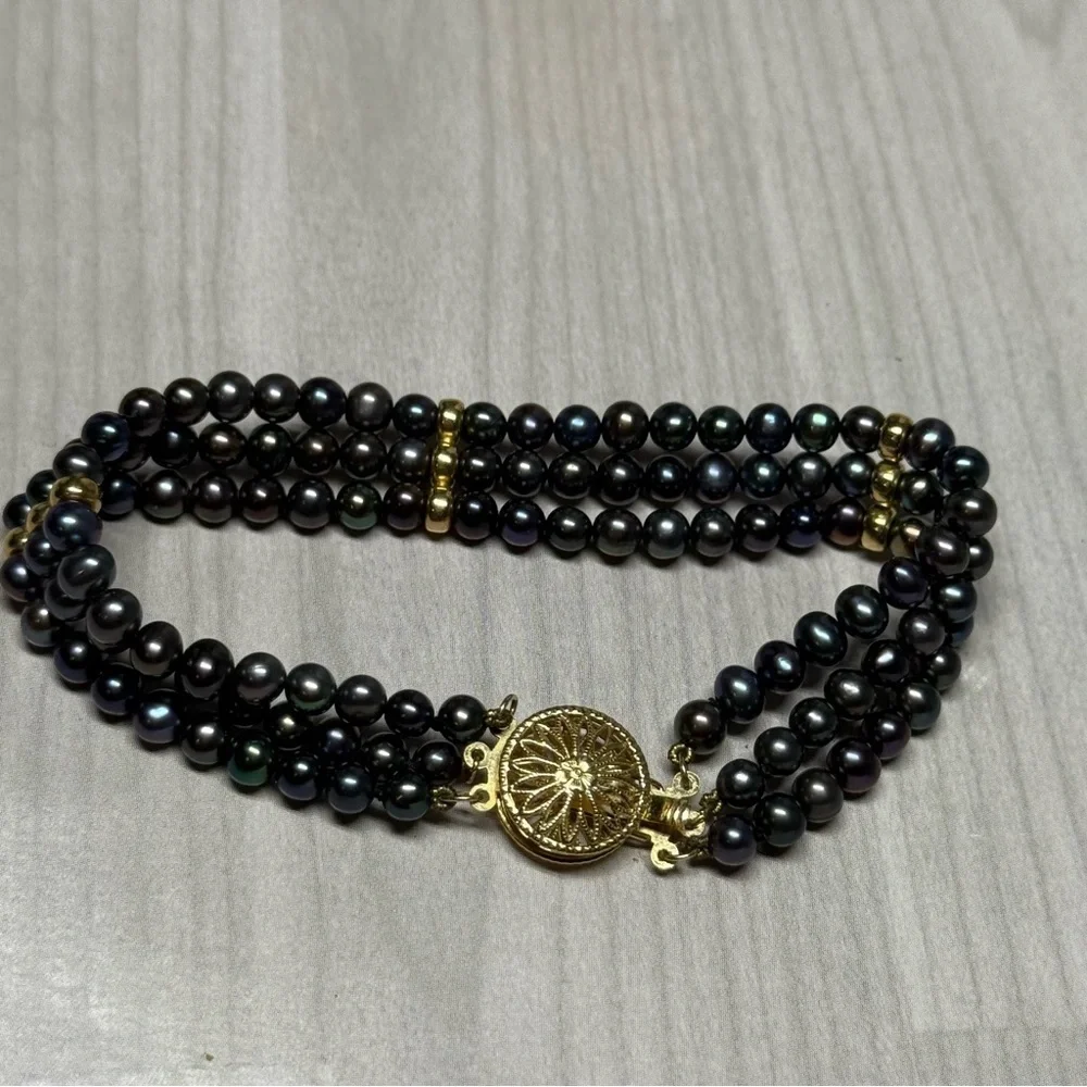 14k Yellow Gold Elegant Black Natural Multi-Strand Pearl Bracelet.
